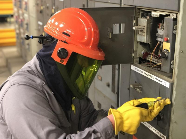 Technician Wearing Proper PPE